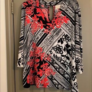 Chico’s peek-a-boo top. Size 3